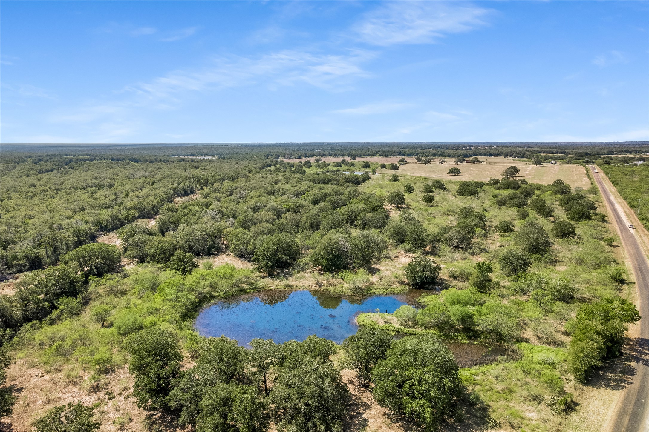 Overview of rural landscape featuring a large body of water