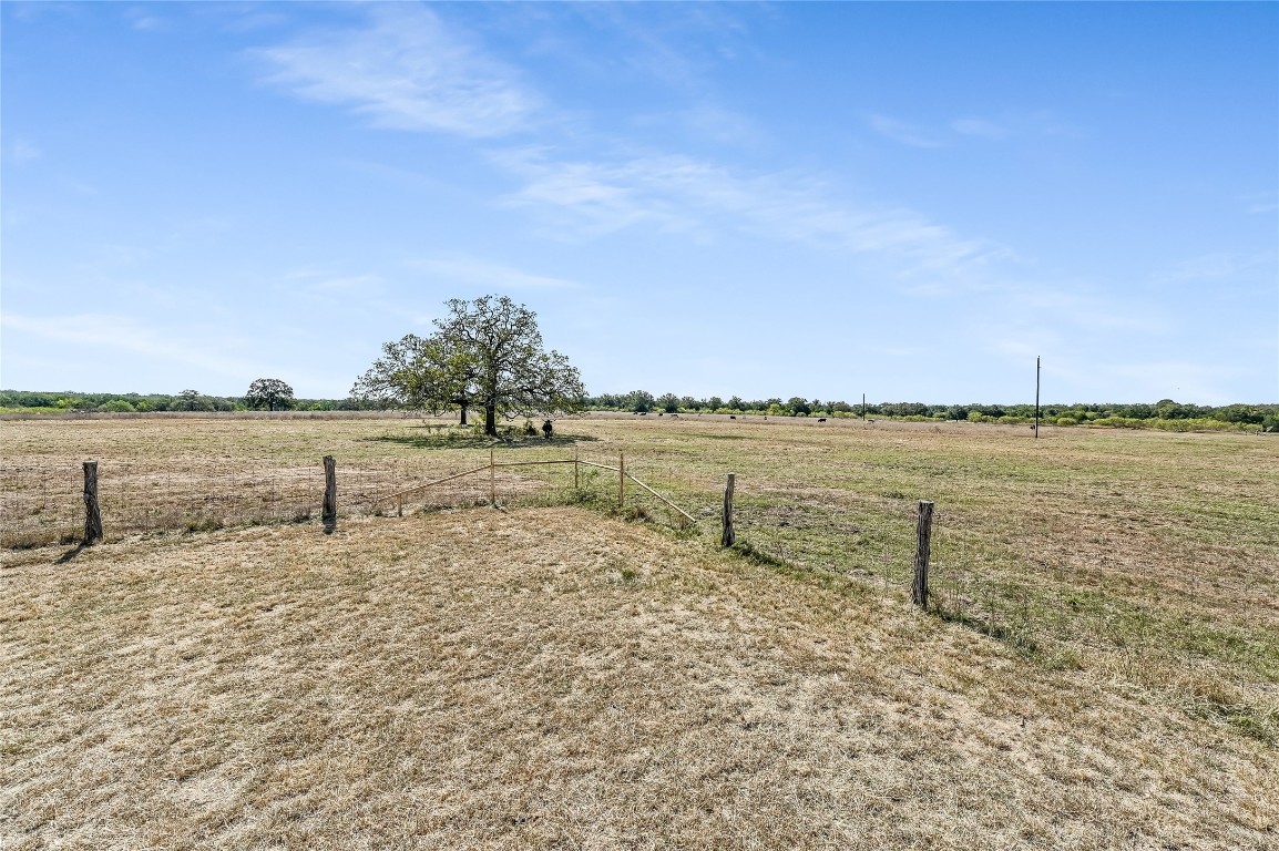 5637 Jeddo Road Waelder, TX 78959 - Photo 23 of 37 a view of a lake with houses in the background