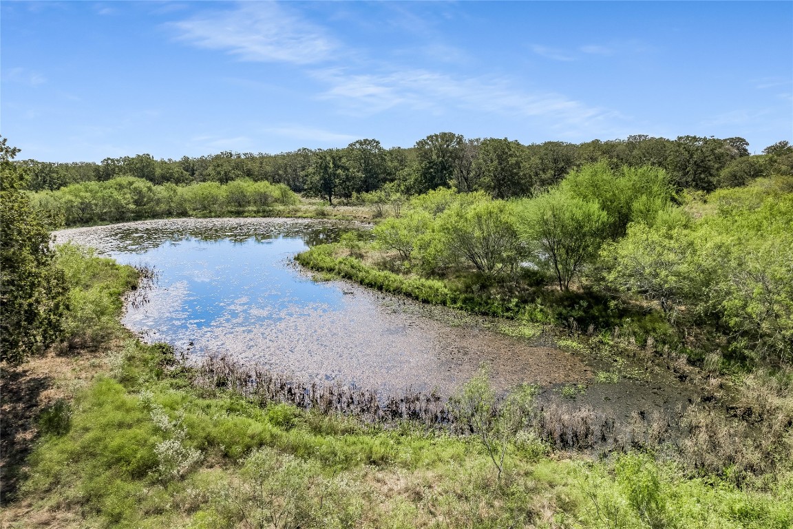 5637 Jeddo Road Waelder, TX 78959 - Photo 28 of 37 a view of a lake with mountain in the background