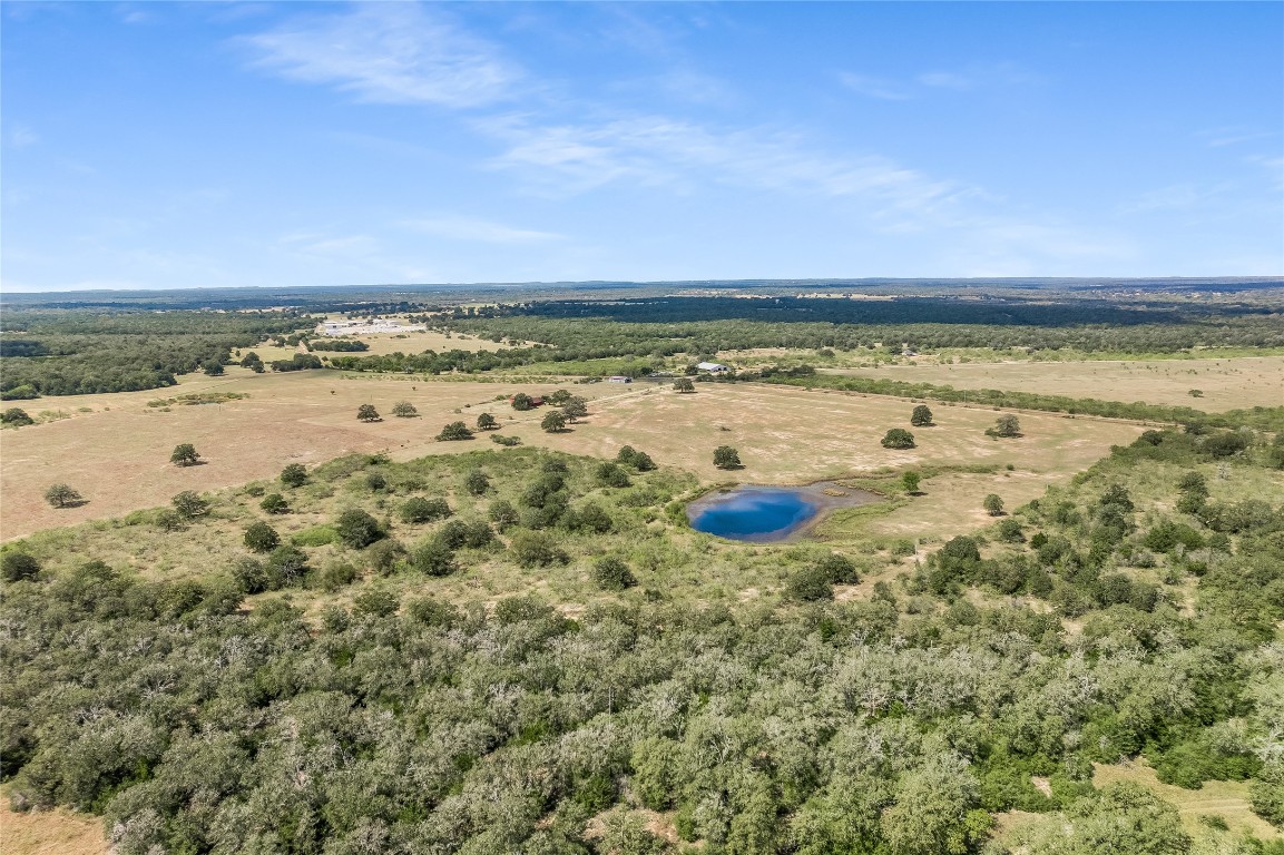 5637 Jeddo Road Waelder, TX 78959 - Photo 30 of 37 a view of a lake with a beach