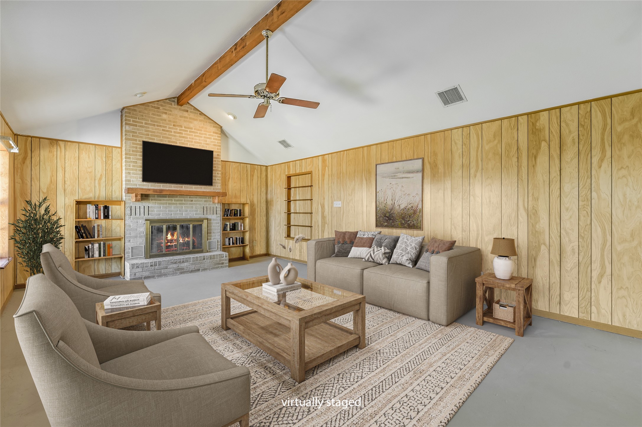 5637 Jeddo Road Waelder, TX 78959 - Photo 4 of 37 a living room with furniture a fireplace and a flat screen tv