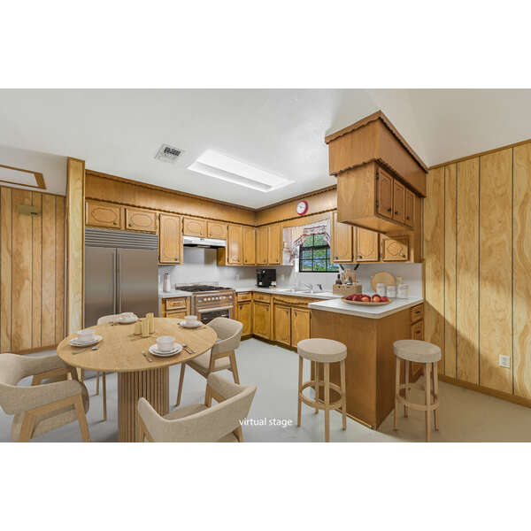 5637 Jeddo Road Waelder, TX 78959 - Photo 5 of 37 a living room with stainless steel appliances kitchen island granite countertop furniture and a large window