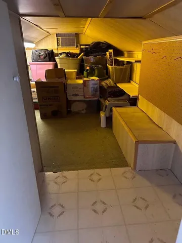 a view of a city street lined with buildings and trees