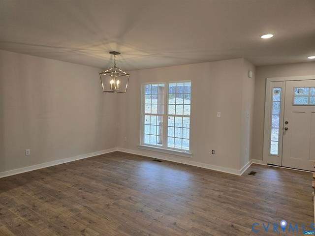 1337 Salem Church Road Palmyra, VA 22963 - Photo 16 of 21 an empty room with wooden floor and windows
