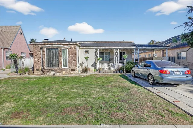 a view of a house with a garage