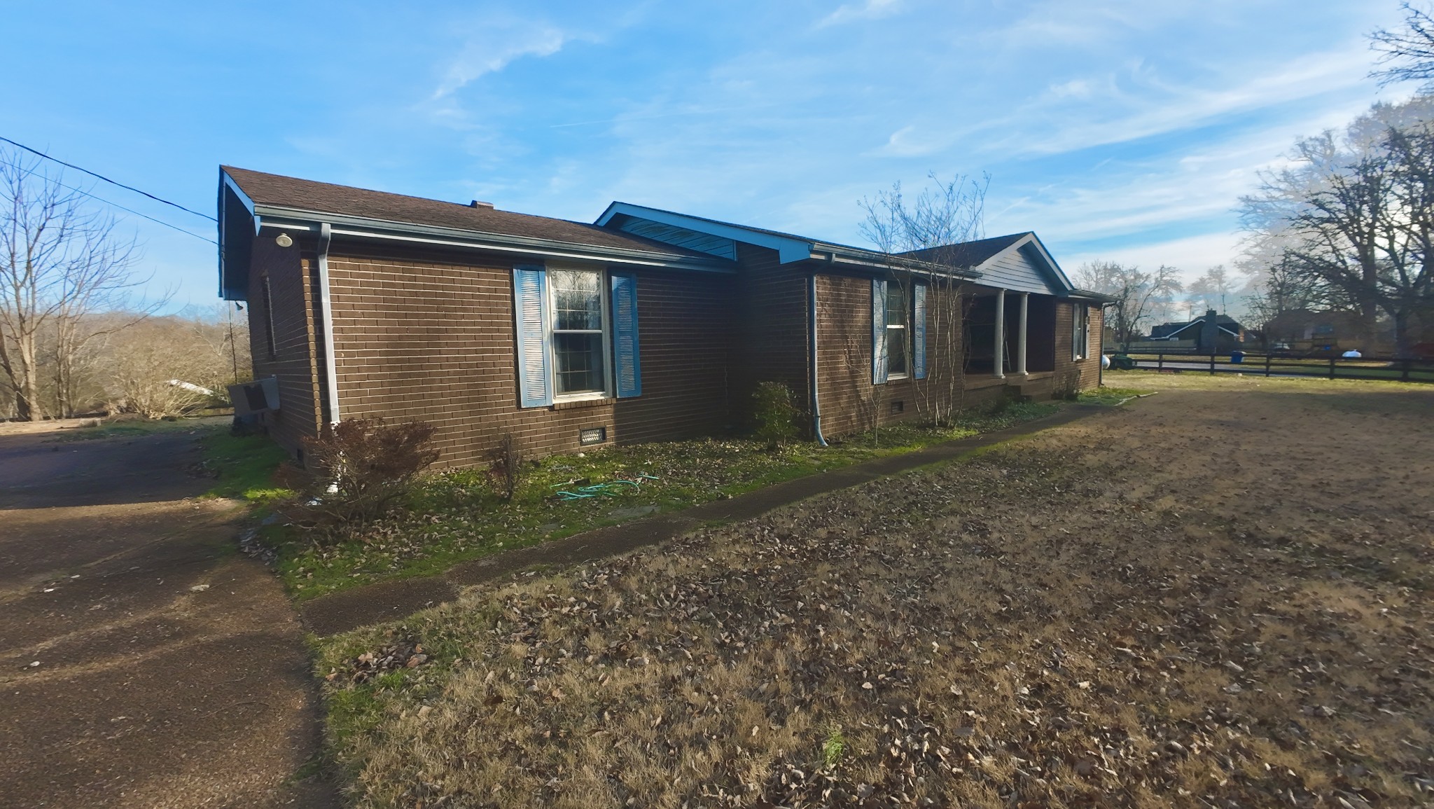 1170 Madison Creek Road Goodlettsville, TN 37072 - Photo 2 of 32 a front view of house with yard and trees