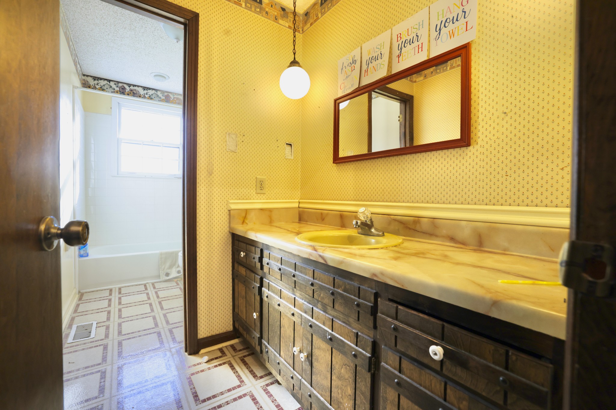 1170 Madison Creek Road Goodlettsville, TN 37072 - Photo 26 of 32 a bathroom with a granite countertop sink a mirror and shower