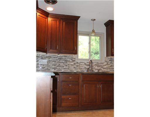554 Thompson Run Road Pittsburgh, PA 15237 - Photo 5 of 16 Kitchen. The kitchen has cherry cabinets and stainless appliances, plus a built in pantry.