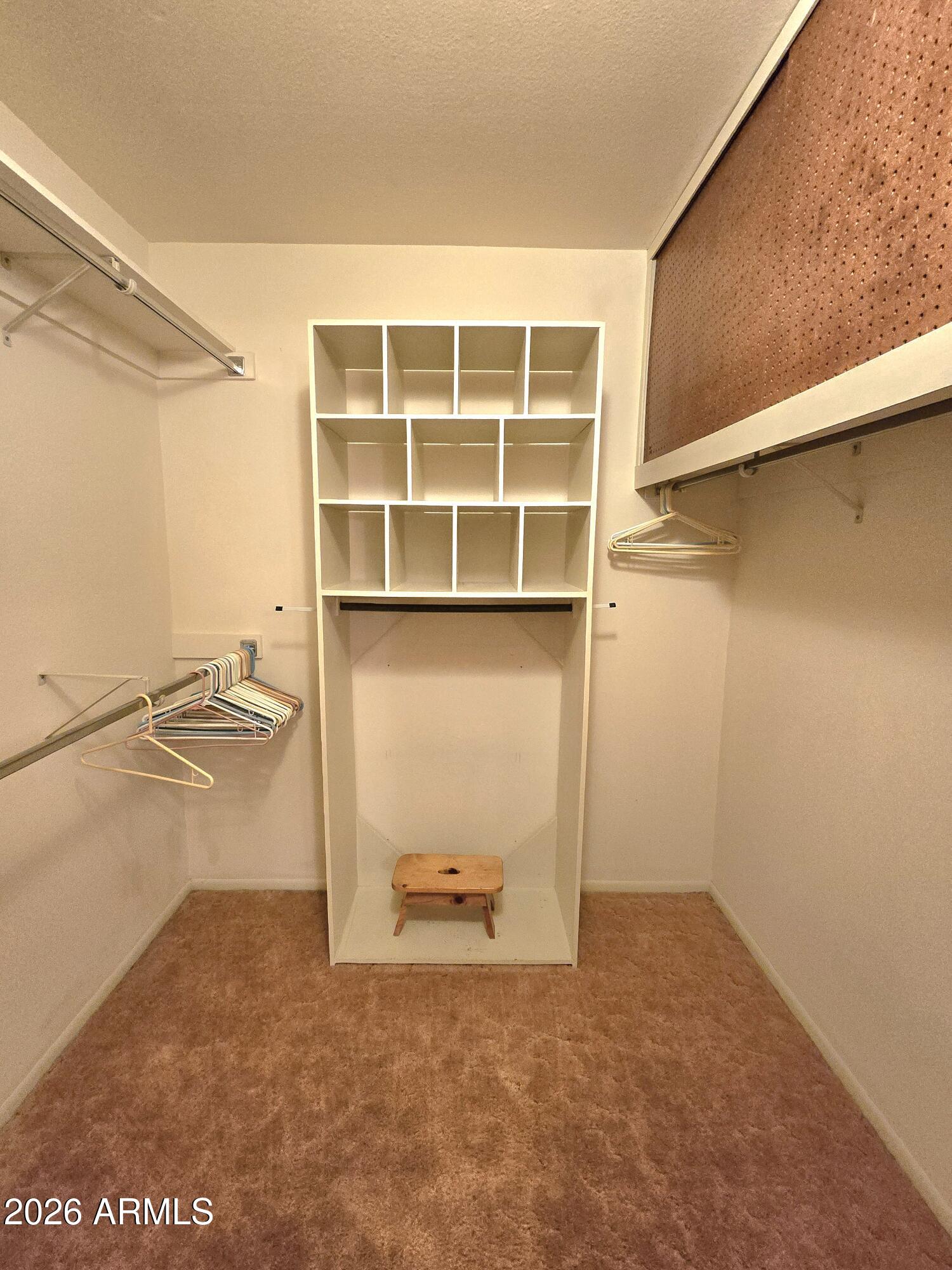 11634 North Rio Vista Drive Sun City, AZ 85351 - Photo 5 of 15 a view of a room with wooden floor and cabinet