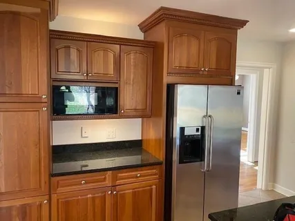 a close view of a stove top oven sitting inside of a kitchen