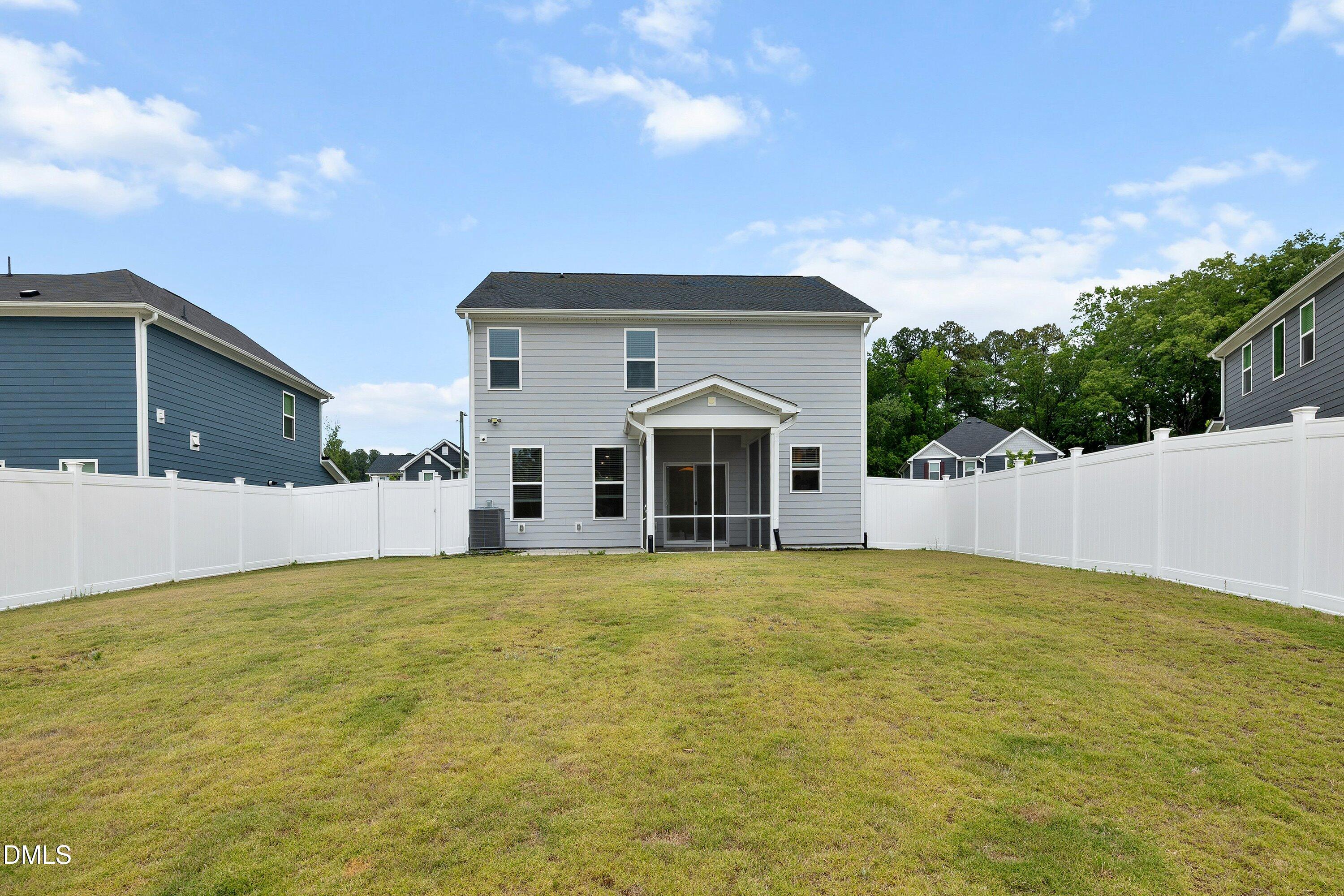 2129 Crestwood Rdg Drive Durham, NC 27704 - Photo 15 of 15 a view of a house with a yard