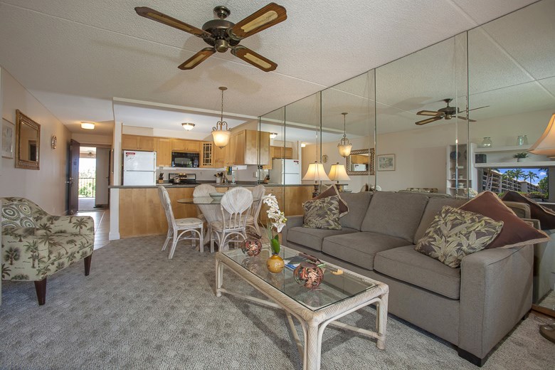 2531 South Kihei Road, Unit C512 Kihei, HI 96753 - Photo 12 of 27 a living room with furniture and a chandelier