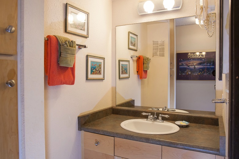 2531 South Kihei Road, Unit C512 Kihei, HI 96753 - Photo 18 of 27 a bathroom with a granite countertop sink and a mirror