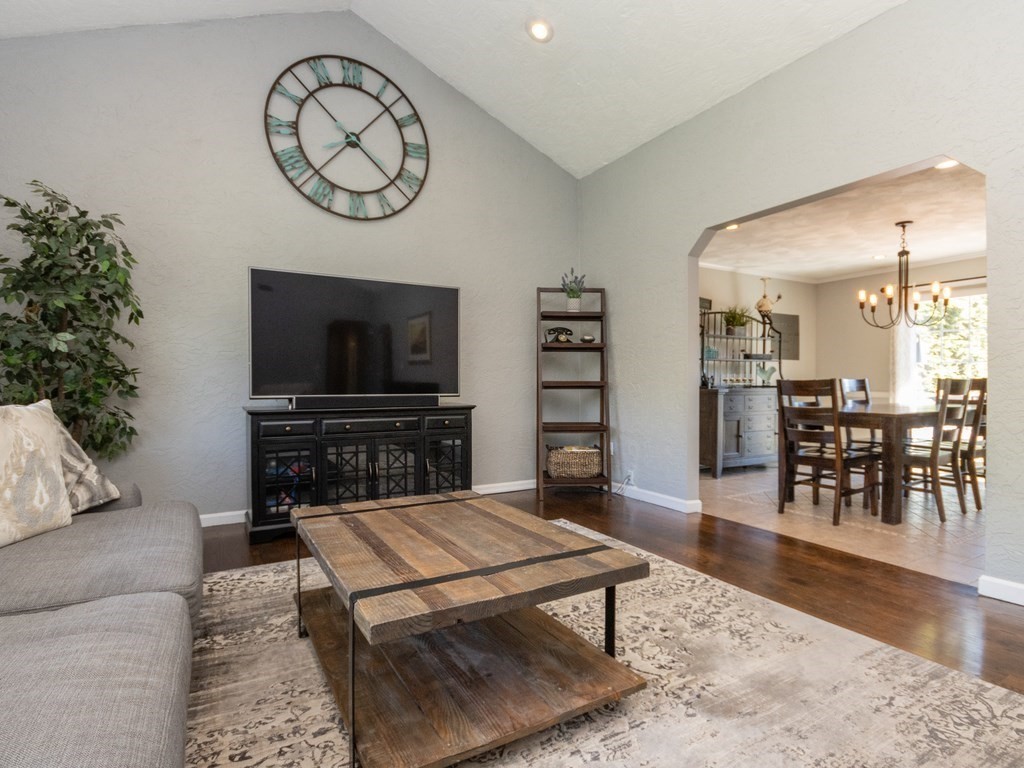 44 Edgewood Road Southborough, MA 01772 - Photo 3 of 40 a living room with furniture a dining table with wooden floor and a potted plant
