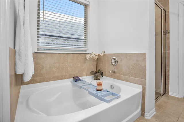 a view of a livingroom with furniture and wooden floor