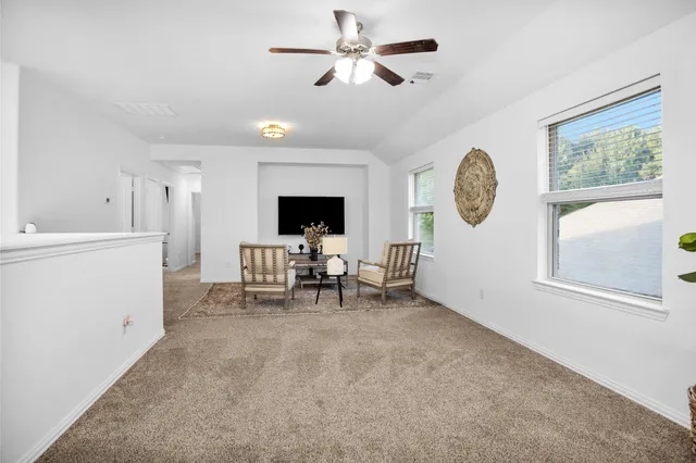 a kitchen with stainless steel appliances granite countertop a stove a refrigerator and a stove