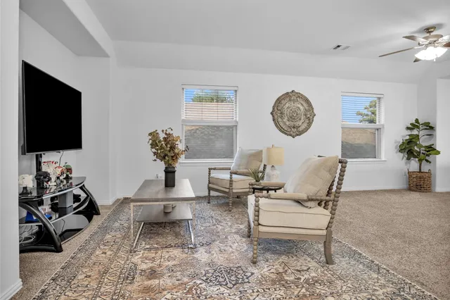 a bathroom with a sink a vanity and a mirror