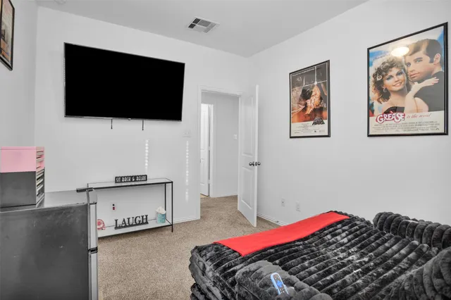 an aerial view of house with yard swimming pool and outdoor seating