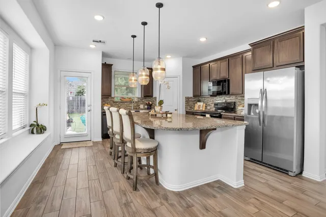 a bathroom with a sink and a bathtub