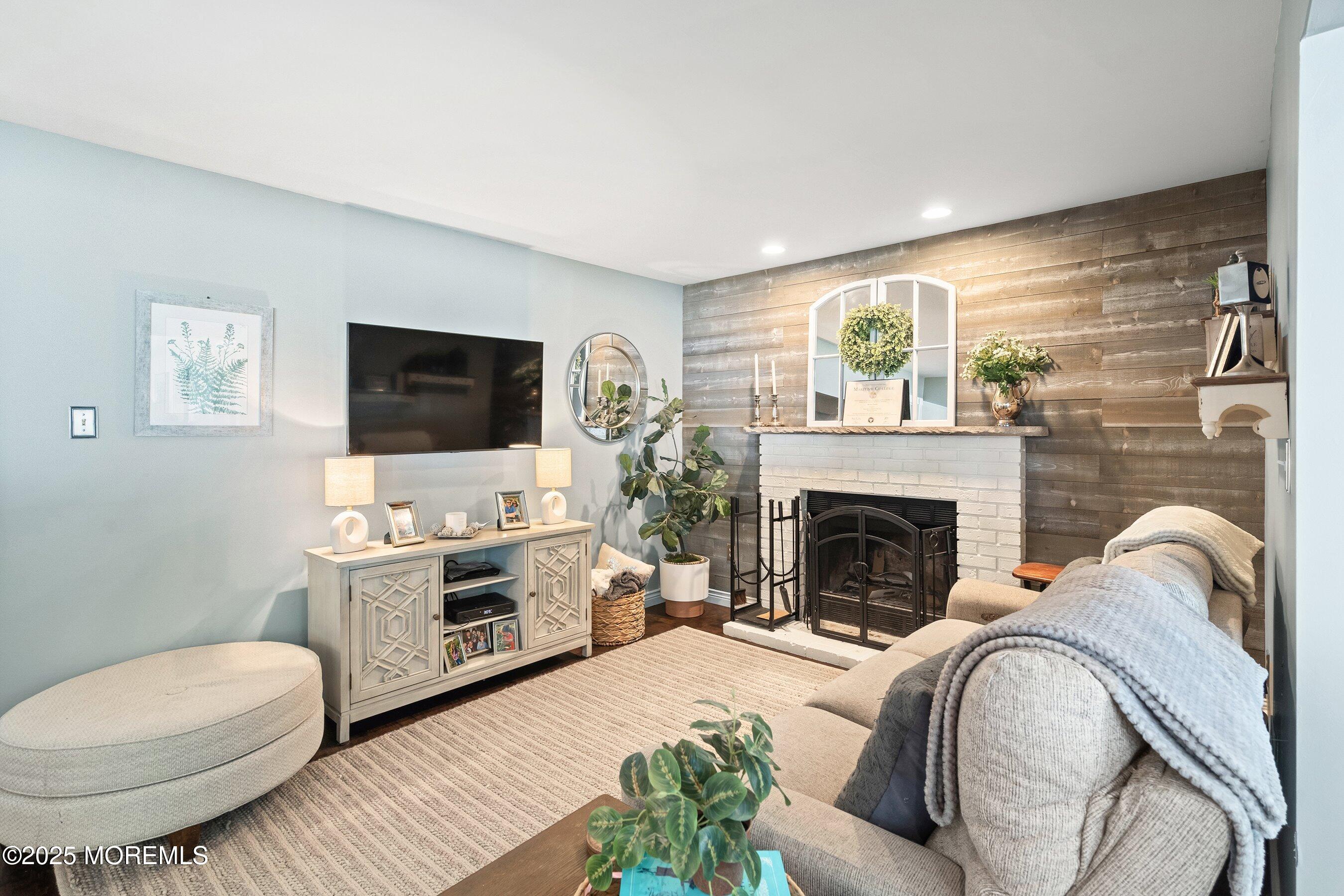 20 Appletree Road Howell, NJ 07731 - Photo 11 of 35 a living room with furniture and a fireplace