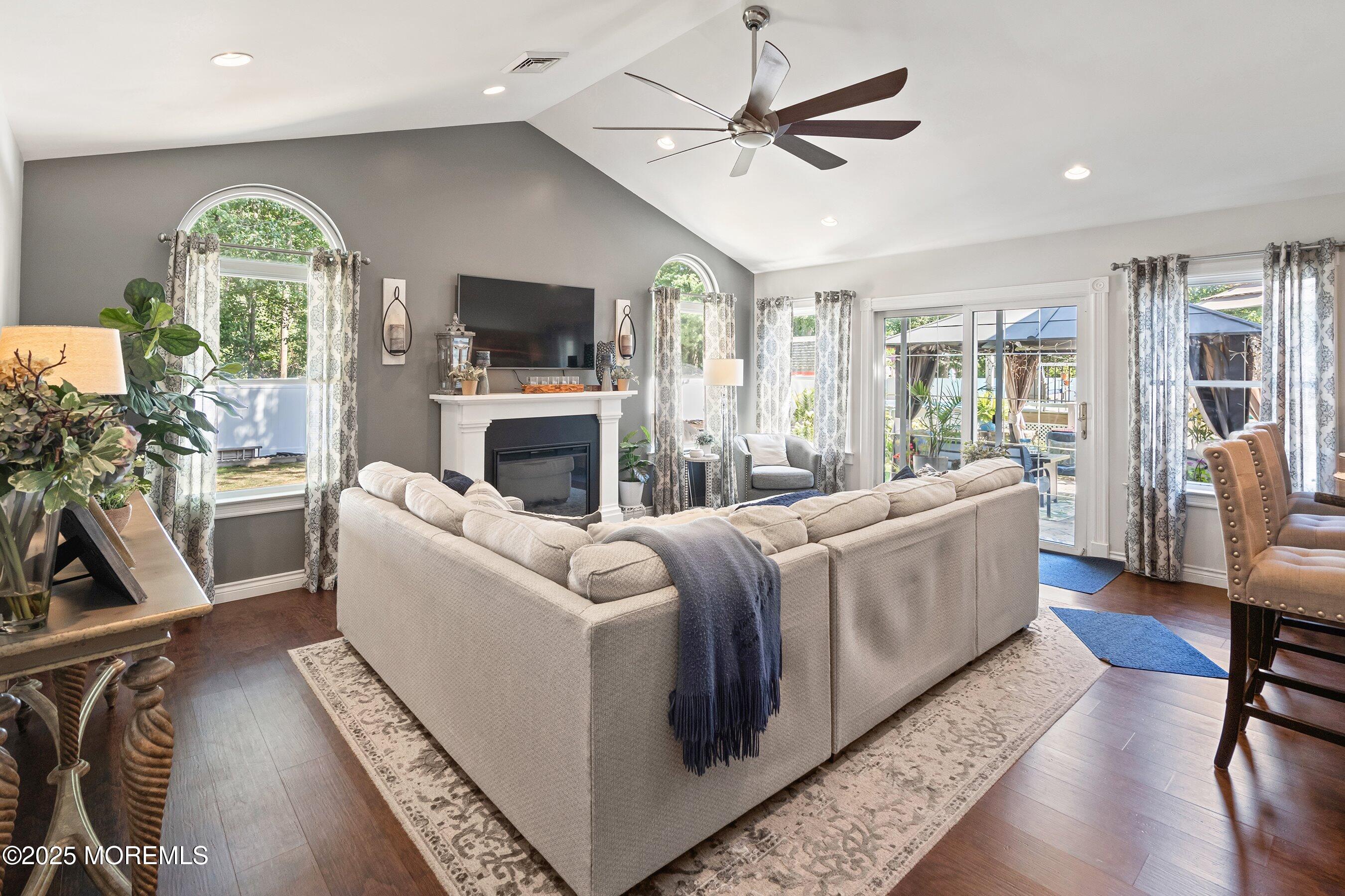 20 Appletree Road Howell, NJ 07731 - Photo 12 of 35 a living room with furniture fireplace and flat screen tv