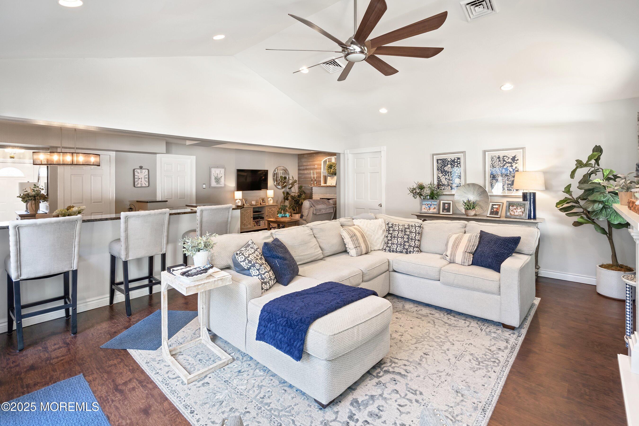 20 Appletree Road Howell, NJ 07731 - Photo 14 of 35 a living room with furniture and a wooden floor