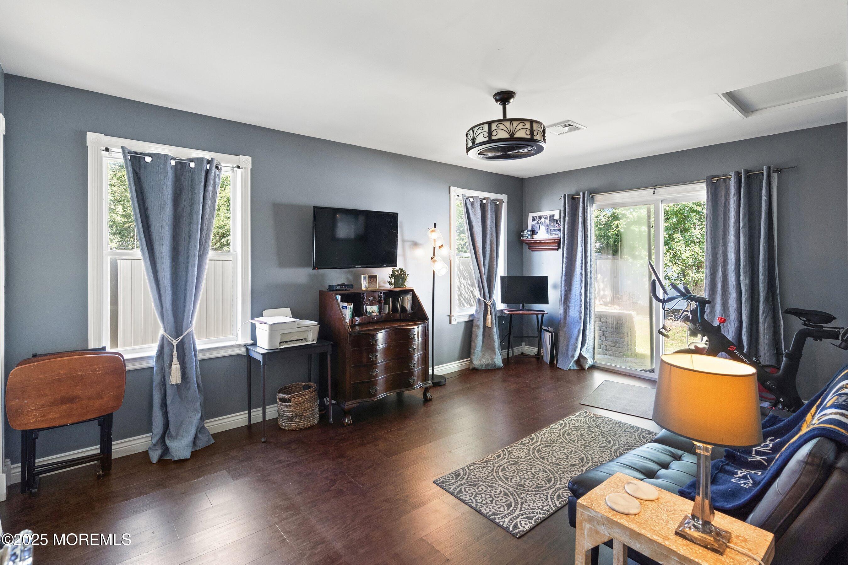 20 Appletree Road Howell, NJ 07731 - Photo 15 of 35 a living room with furniture and a flat screen tv