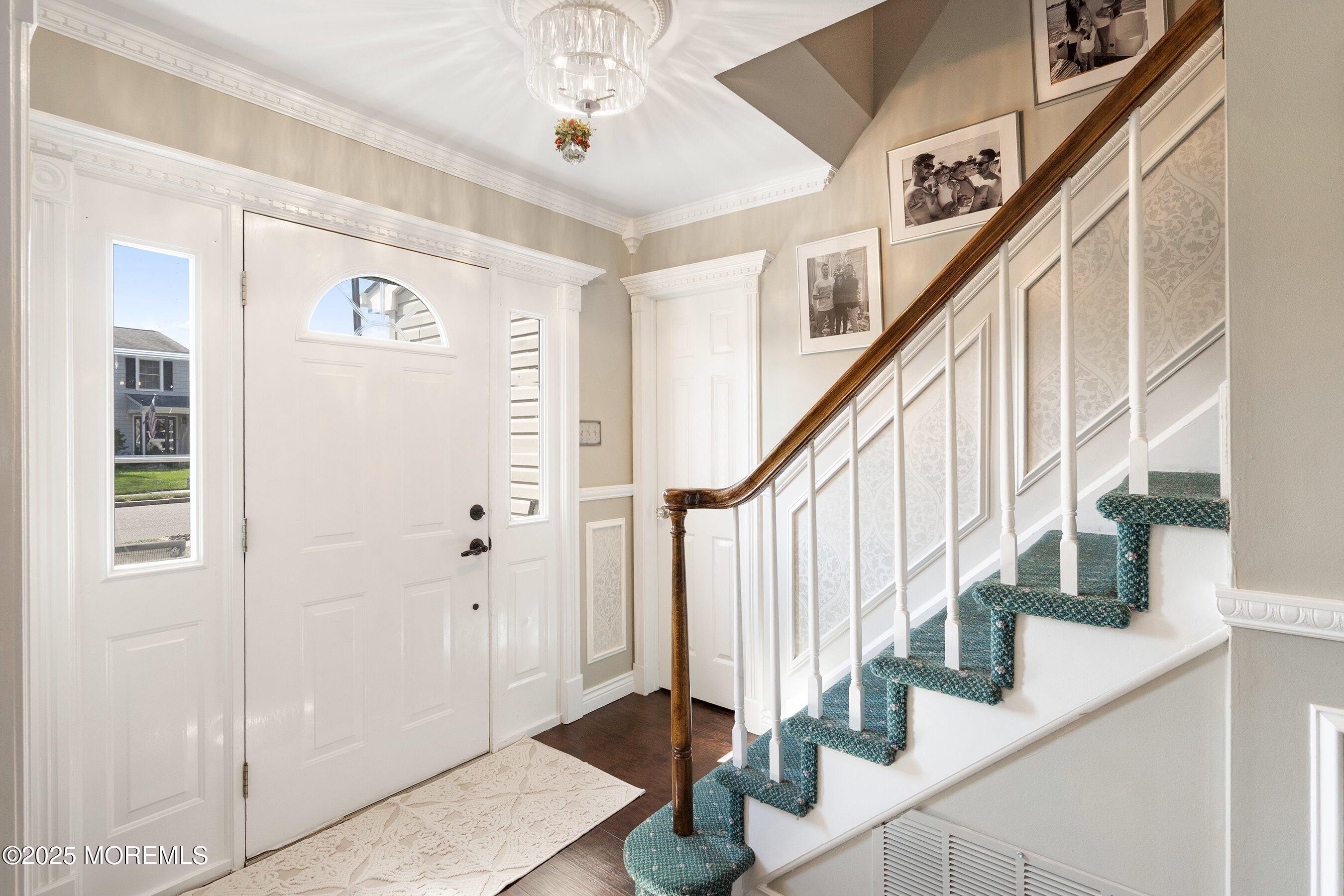 20 Appletree Road Howell, NJ 07731 - Photo 17 of 35 a view of entryway with wooden floor and stairs