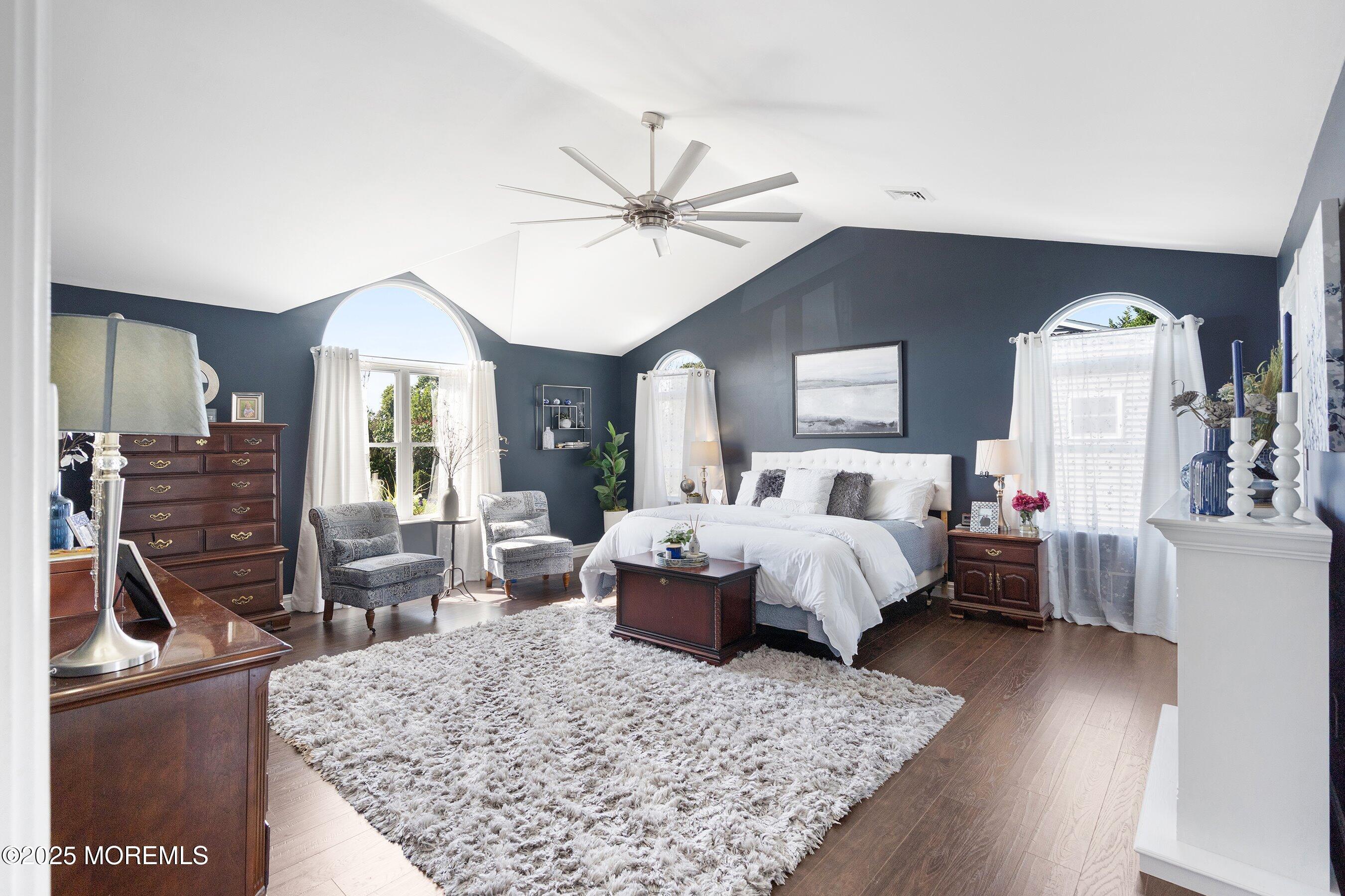 20 Appletree Road Howell, NJ 07731 - Photo 18 of 35 a spacious bedroom with a bed a couch and dresser