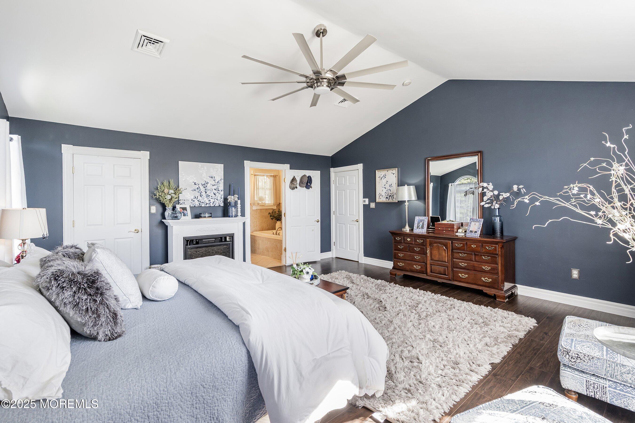 20 Appletree Road Howell, NJ 07731 - Photo 19 of 35 a bedroom with a bed and ceiling fan