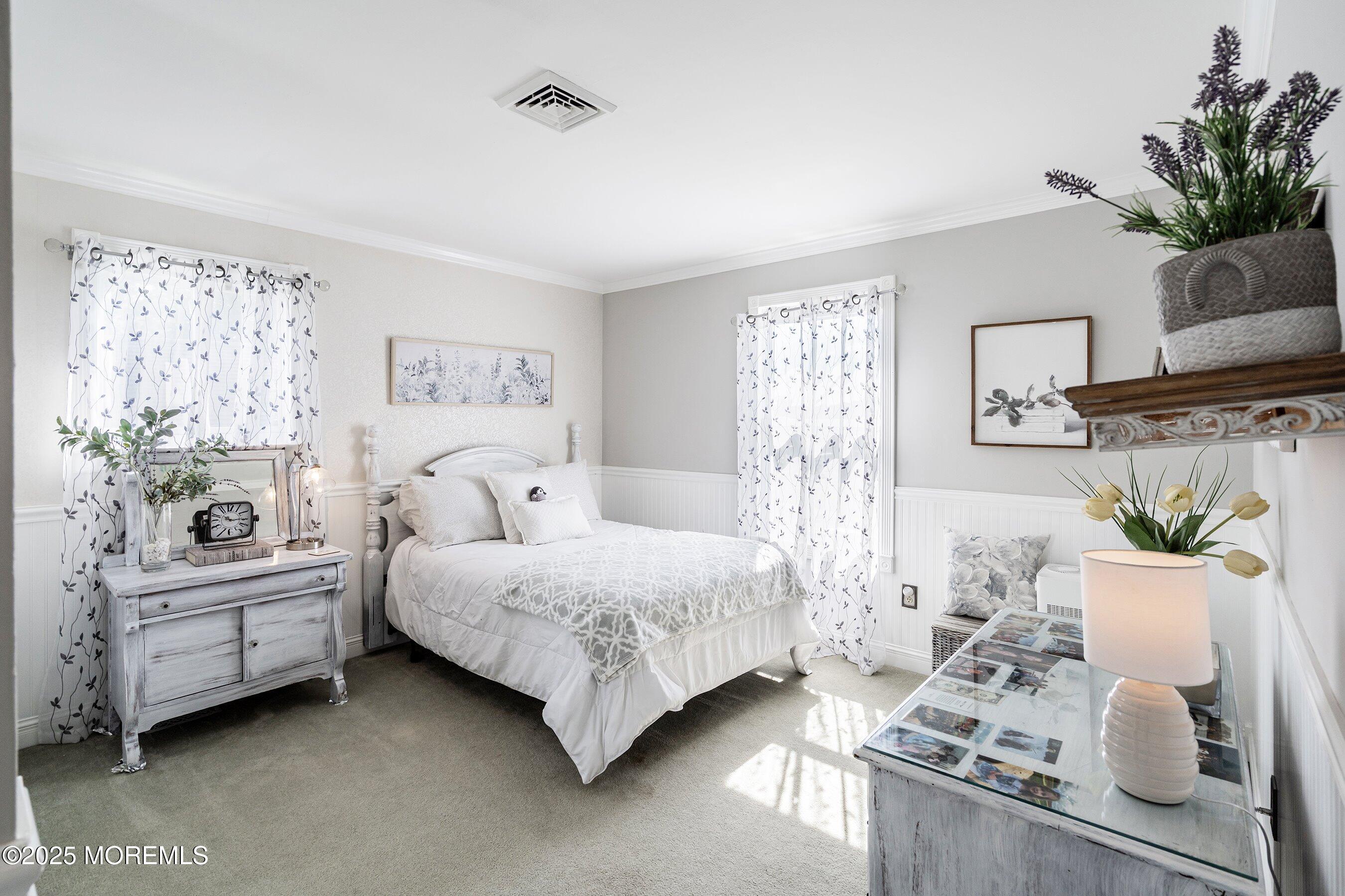 20 Appletree Road Howell, NJ 07731 - Photo 28 of 35 a bedroom with a bed and a couch