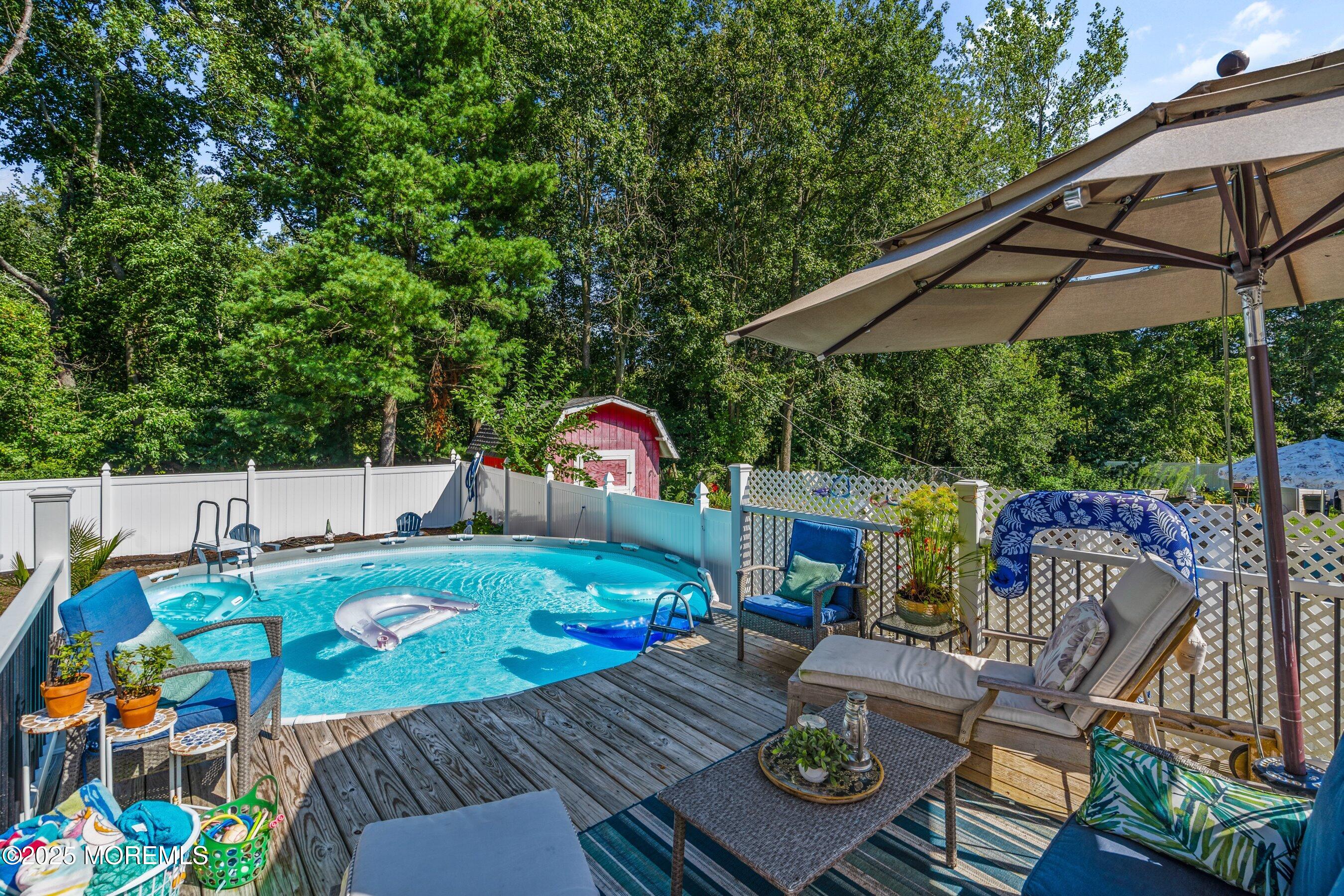 20 Appletree Road Howell, NJ 07731 - Photo 32 of 35 a view of deck with furniture and barbeque grill