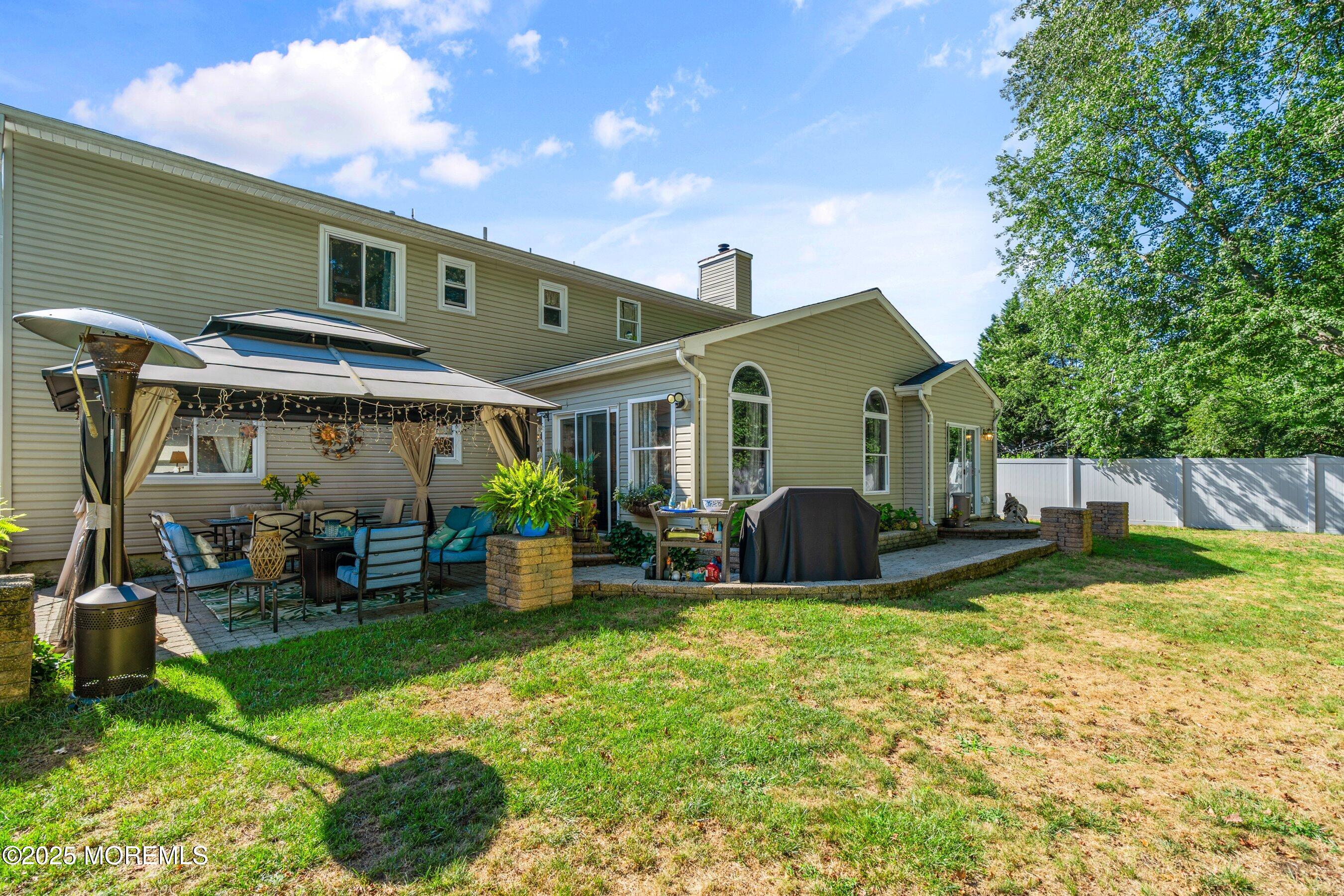 20 Appletree Road Howell, NJ 07731 - Photo 34 of 35 a view of a house with a yard porch and sitting area