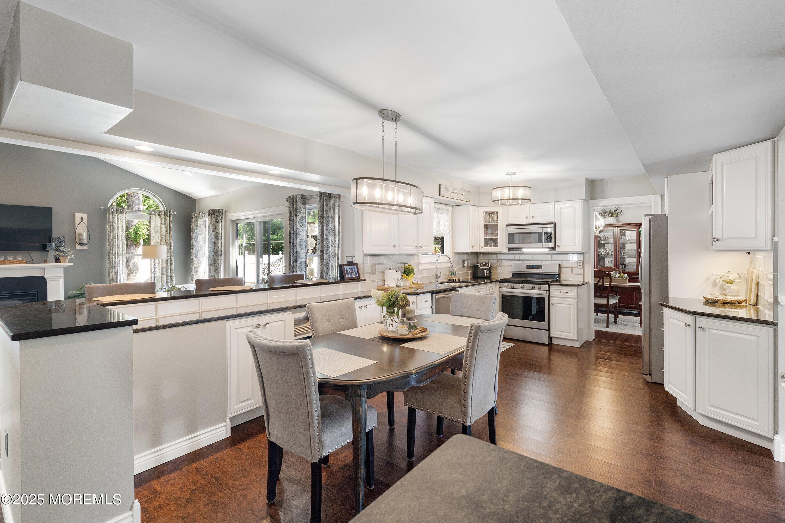 20 Appletree Road Howell, NJ 07731 - Photo 5 of 35 a large kitchen with a table and chairs