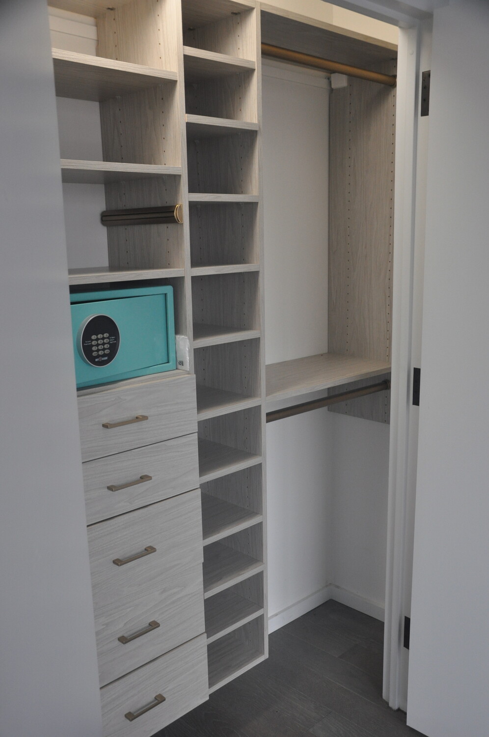 385 1st Avenue, Unit 12D Manhattan, NY 10010 - Photo 10 of 19 a view of walk in closet with empty racks