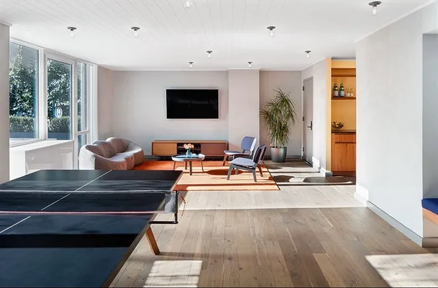 a room with furniture and window