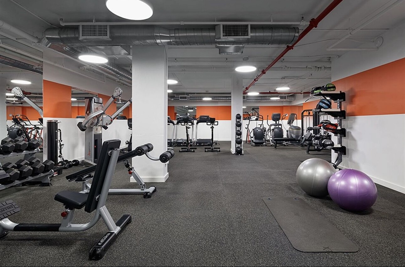 385 1st Avenue, Unit 12D Manhattan, NY 10010 - Photo 17 of 19 a room with gym equipment