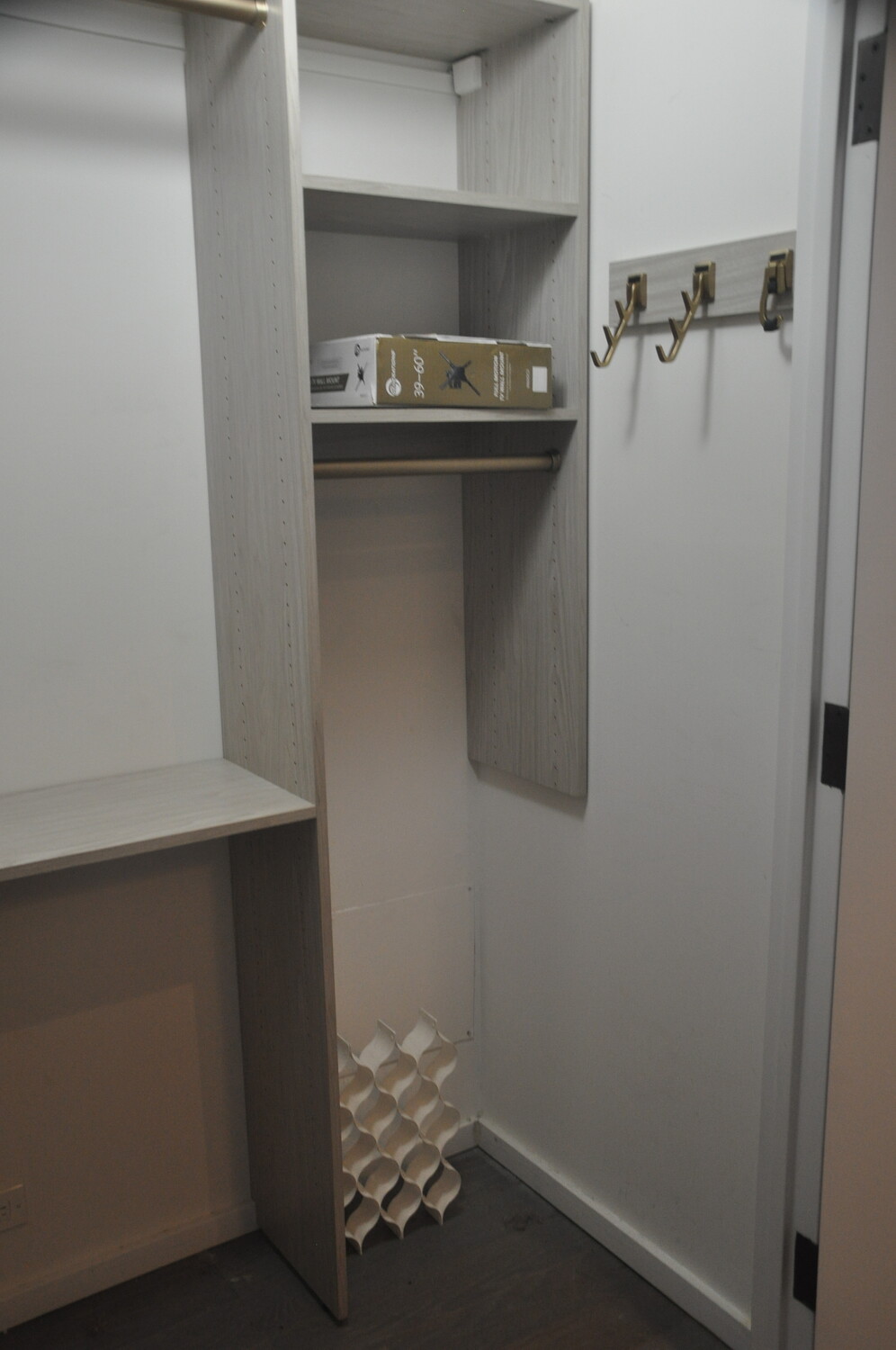 385 1st Avenue, Unit 12D Manhattan, NY 10010 - Photo 5 of 19 a room with water heater and cabinets