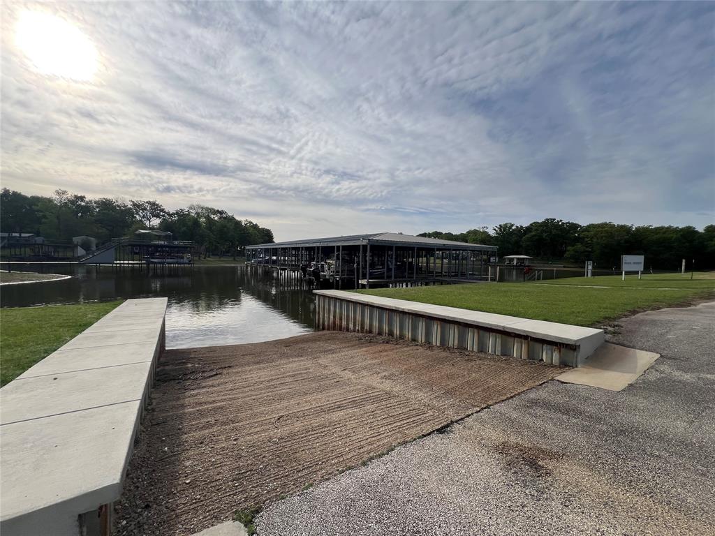 10 Esquire Estates Road Mabank, TX 75156 - Photo 2 of 6 a view of park with river and trees in the background