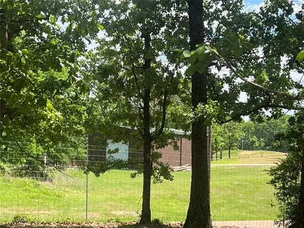 a view of a golf course with a lake