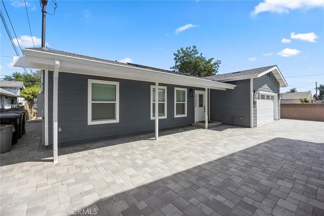 a house view with a outdoor space