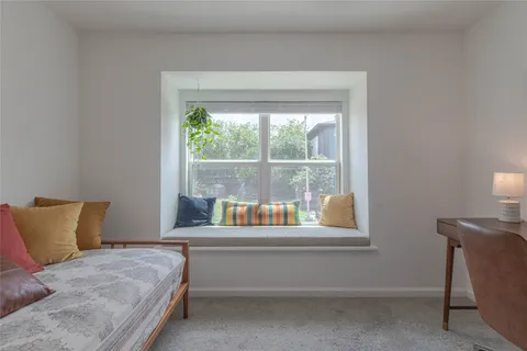 a balcony with wooden floor
