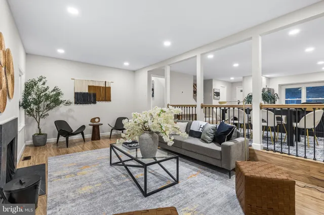 a bedroom with a bed and a table