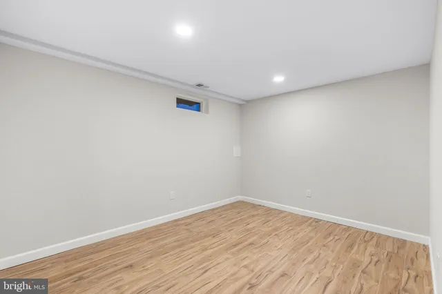 a bathroom with a sink toilet and mirror