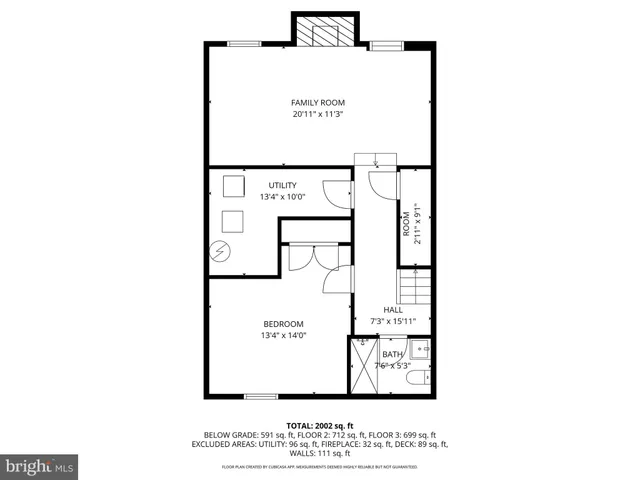 a picture of a bench in front of a wall