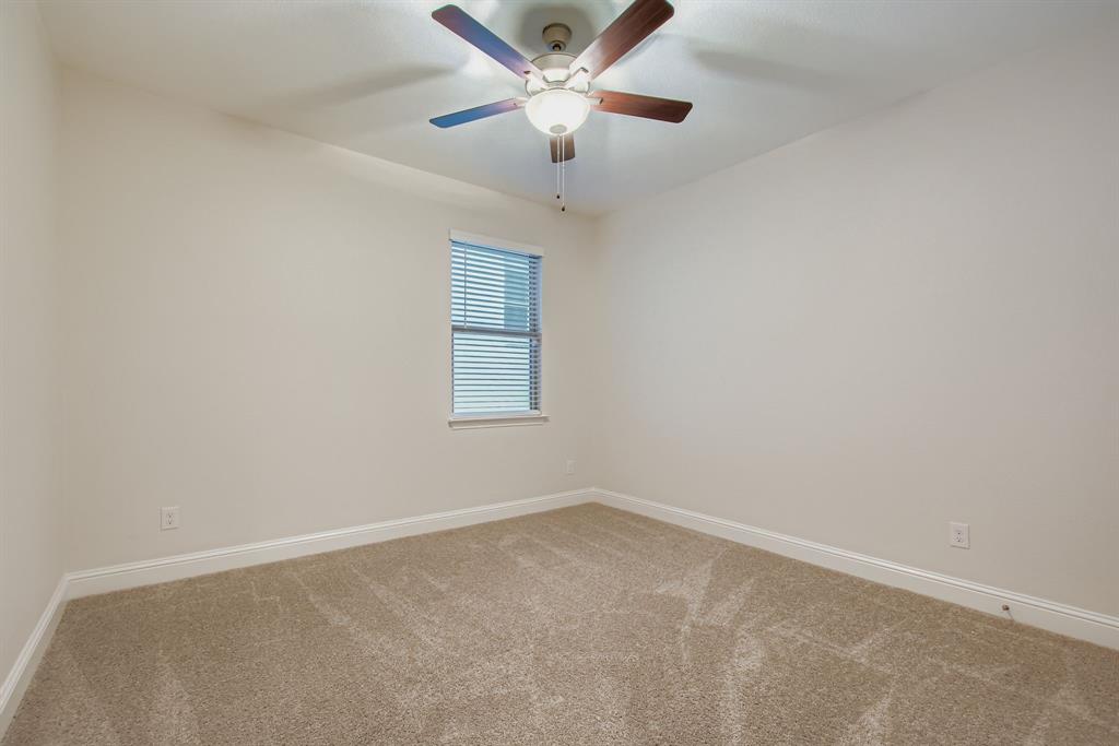 312 Magnolia Drive Oak Point, TX 75068 - Photo 17 of 28 Spare room with carpet floors and ceiling fan