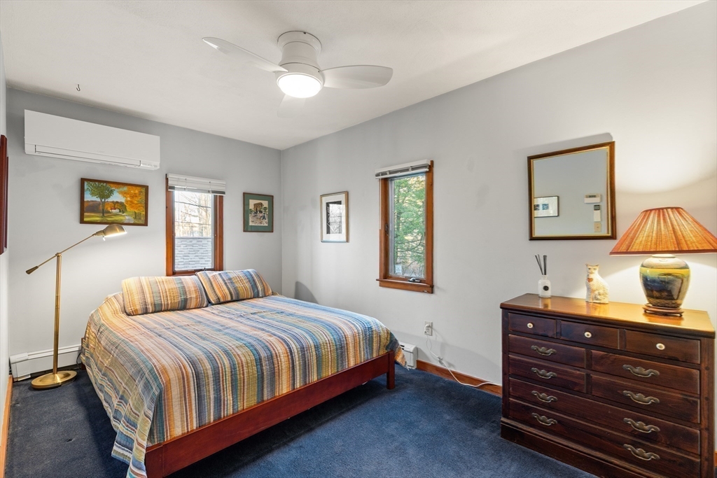 175 Mountain Street Sharon, MA 02067 - Photo 17 of 28 a bedroom with a bed and a window