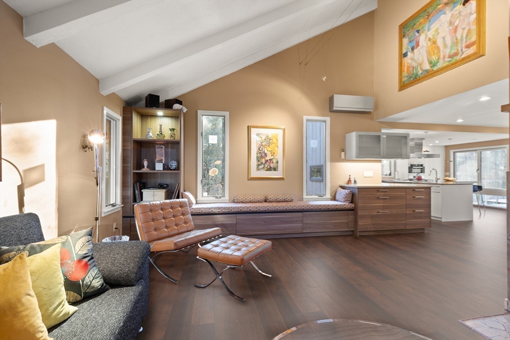 175 Mountain Street Sharon, MA 02067 - Photo 7 of 28 a living room with furniture and large windows
