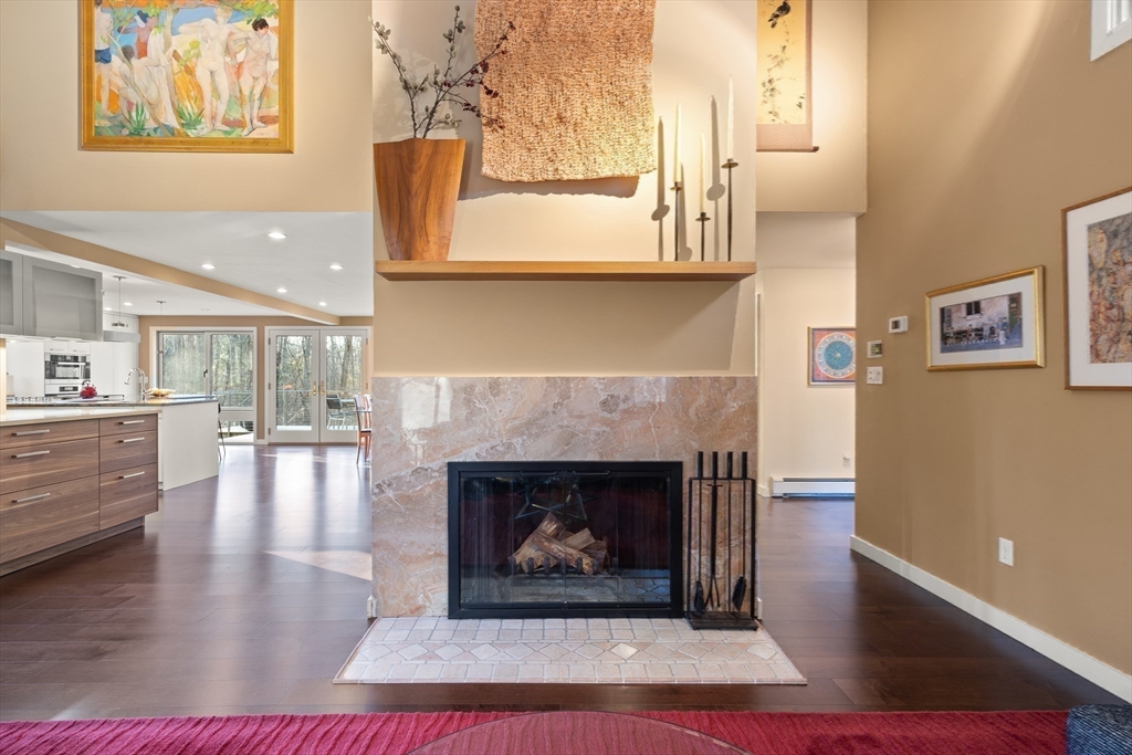 175 Mountain Street Sharon, MA 02067 - Photo 9 of 28 a living room with furniture and a fireplace