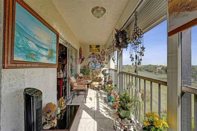 a view of a chairs and table in the terrace